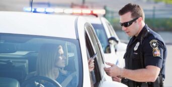 can a cop pull you over if you're already parked and out of the car